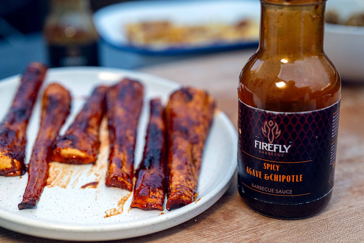 Black bottle of vegan hot agave and chipotle barbecue sauce