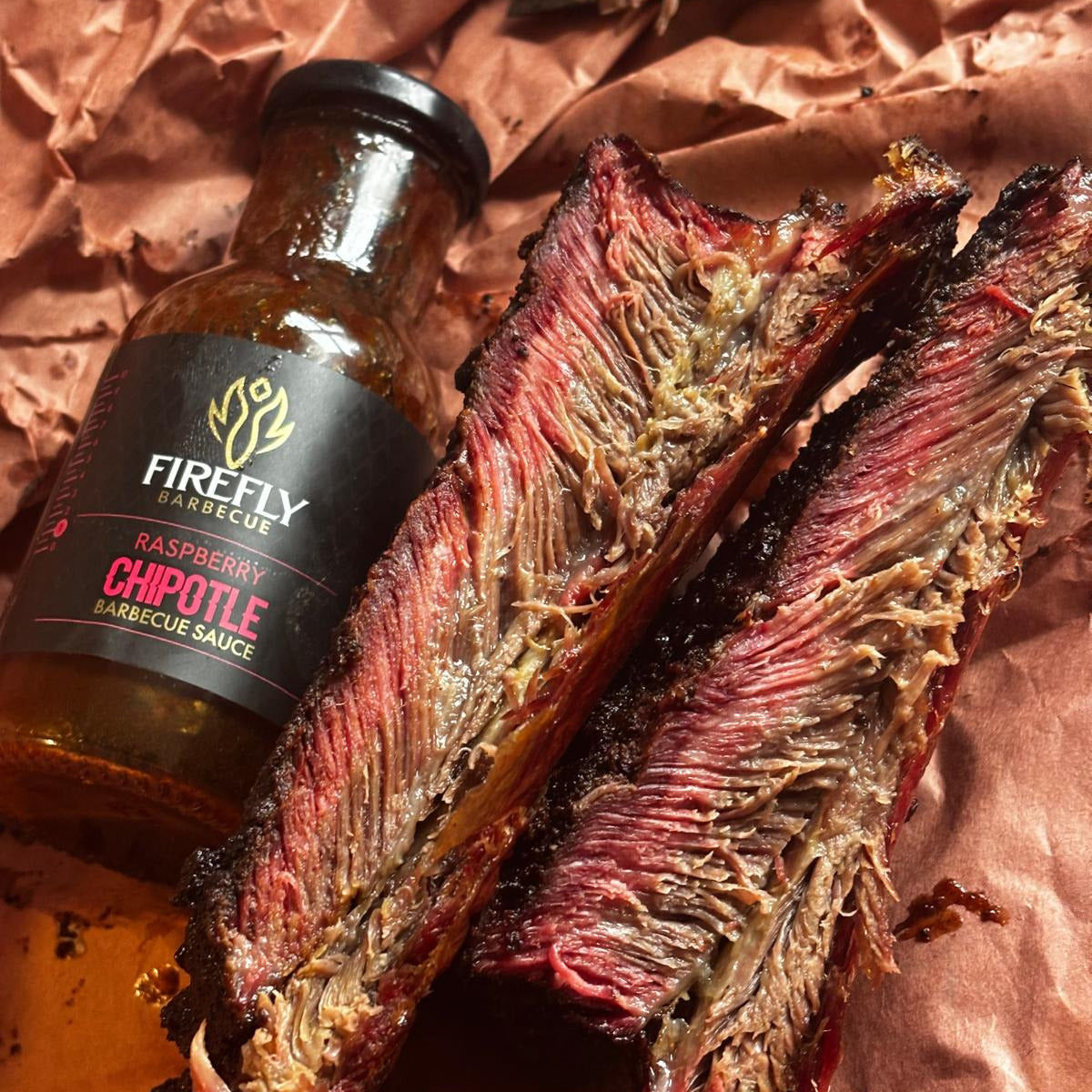 Raspberry Chipotle BBQ Sauce bottle for grilling